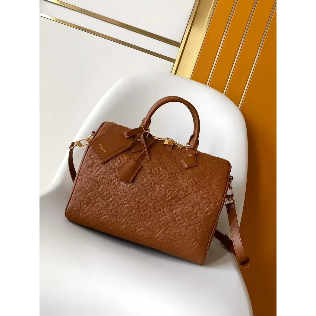 Heritage Embossed Duffle — Tan