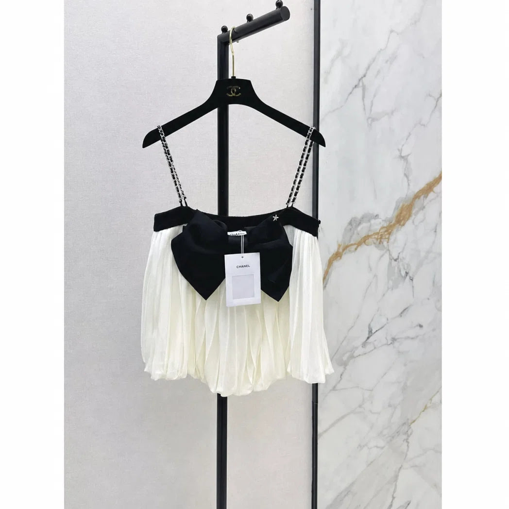 Chanel Bow-Detail Camisole and Pleated Skirt Set — Black / Ivory