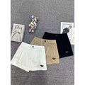 Prada Triangle Logo Shorts — Beige, Black, White